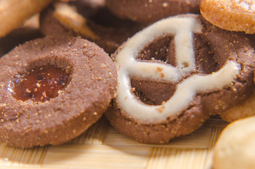 assorted cookies on wooden tray