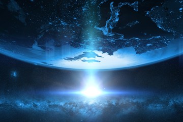 sunset over planet Earth in front of the Milky Way galaxy 