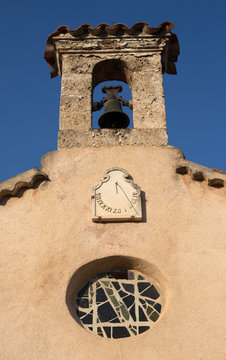 Bell tower with a sun clock