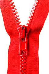 Red zipper with a runner on a white background. © Alexander