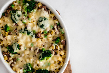 Pasta with vegetables, meat and cheese.