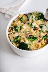 Pasta with vegetables, meat and cheese.