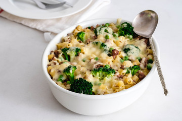 Pasta with vegetables, meat and cheese.