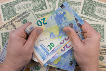 Men hand holding  Euro banknotes. Background with money