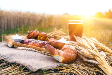 Fresh bread and a drink, bakery products closeup
