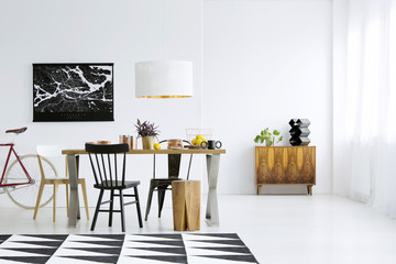 Patterned carpet in dining room