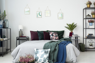 Big bed with cushions - obrazy, fototapety, plakaty