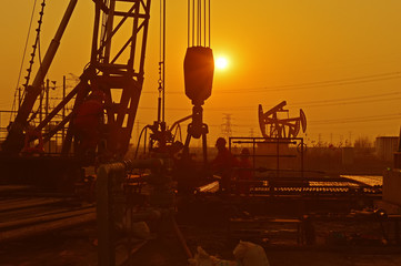 The oil workers in the job