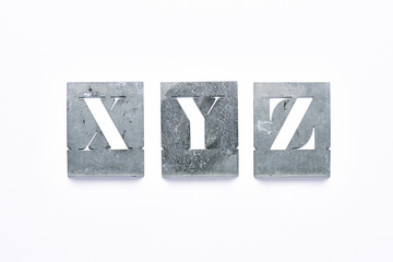 Metal X, Y,  Z letters on a white background