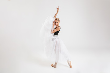 Fototapeta na wymiar Beautiful young woman ballerina