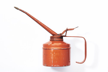 Vintage orange oil can can on a white background