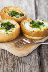 Scrambled eggs with cheese and bacon