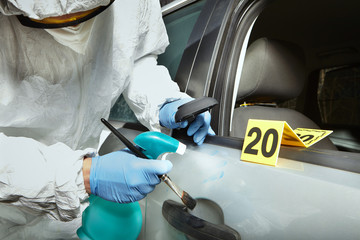 Crime scene investigation - developing of latent fingerprint on car