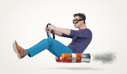 Funny man in goggles car driver with a wheel, concept of alternative transport
