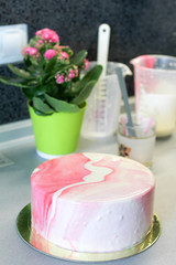 Tasty pink homemade cake decorated