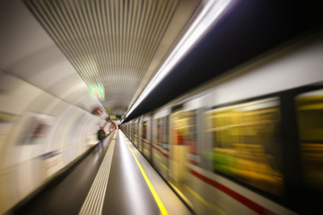 subway train passing platform