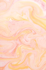 Fototapeta na wymiar abstract light pink and orange painted texture