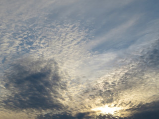 Cirrus clouds in the sky during sunset. Picturesque sky