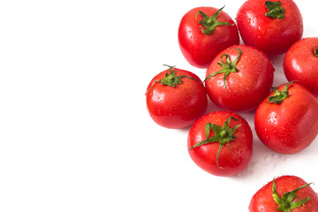 Tomatoes with drops of dew on a white isolated background, for the design of a cover, letters, cards