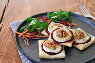 mini pizza with goat cheese and beetroot