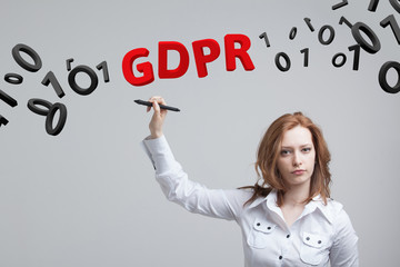 GDPR, concept image. General Data Protection Regulation, the protection of personal data. Young woman working with information.