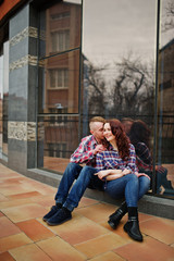 Obraz na płótnie Canvas Stylish couple wear on checkered shirt in love together.