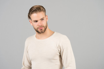 Man in fashionable tshirt, fashion. Man with bearded face and blond hair, haircut. Grooming and hair care in beauty salon, barbershop. Mens fashion, style and trend, copy space