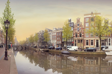 Fototapeta premium Canals of Amsterdam. Moody panorama of Rossebuurt district