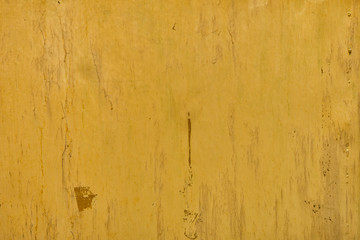Yellow painted metal surface as background or texture. Old metal background. Painted metal texture