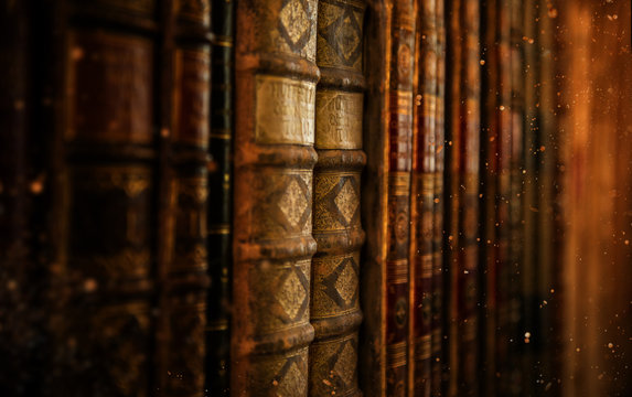 Antiquarian vintage books in old library.