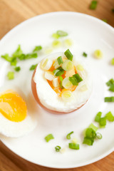 Healthy breakfast - soft boiled egg with toast and herb - healthy breakfast. Selective focus