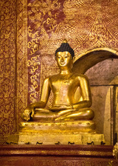 buddha at wat pra singha chiangmai thailand