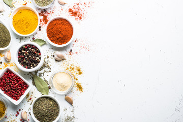 Spices in a bowls on white. - Powered by Adobe