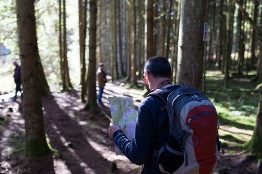 Older map finding his way in the woods