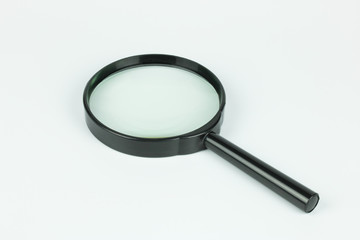 Magnifying glass on white background