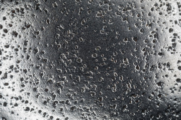 Rough, shiny metal texture