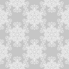 Gray and white floral ornament. Seamless pattern
