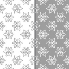 White and gray set of floral seamless patterns
