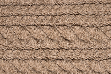 texture of yellow knitted fabric, close-up, top view