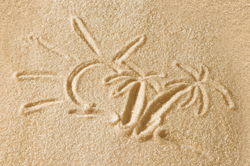 The palms are painted in the sand. Beach background. Top view. The concept of summer, summer kanikkuly, vacation, holydays.