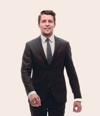 in full growth.confident businessman goes forward