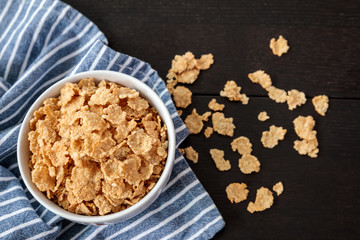 Healthy Corn Flakes with milk for Breakfast on table, food and drink