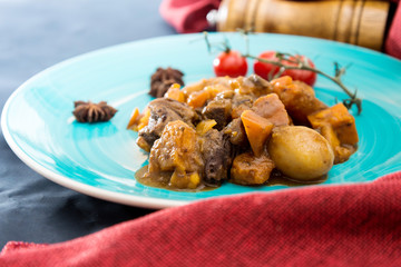 Beef stewed and Carrots potatoes with a wine sauce and herbs