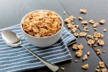 Healthy Corn Flakes with milk for Breakfast on table, food and drink
