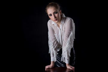 girl in white shirt and black leather skirt