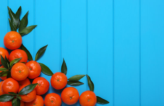 Orange on wooden background.