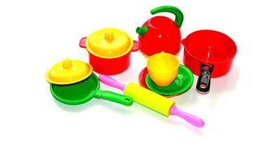 Children's toy dishes, isolated on a white background.