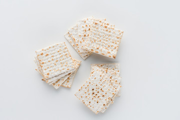 top view of matza on white table, Pesah celebration concept