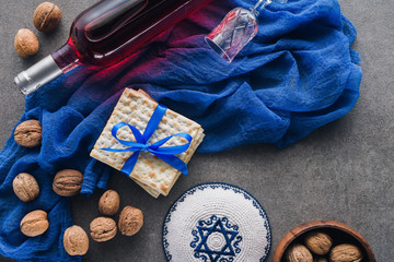 top view of matza, kippah and wine, jewish Passover holiday concept