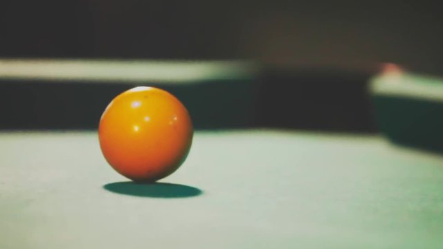 Billiard good shot orange ball goes in